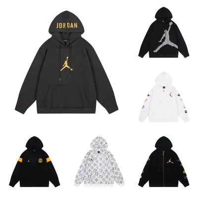 Black and white zip and pullover hoodies laid out flat