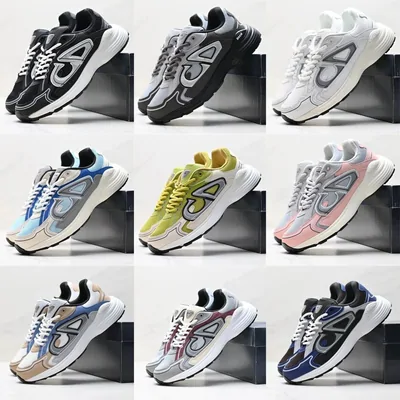 Chunky grey and white trainers lined up in rows